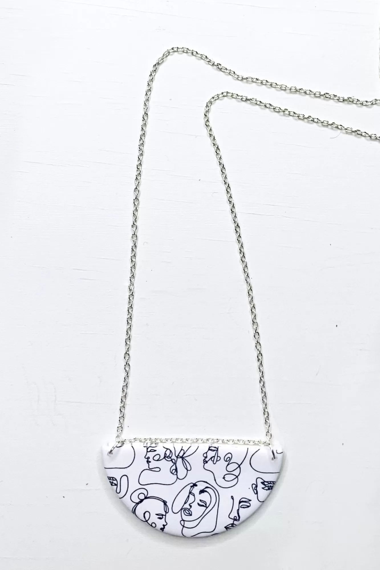 No Shrinking Violet Statement Styles>Faces White Medium Necklace